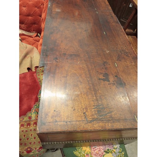 818 - An early 19th century mahogany cased spinet, later converted to a console/side table, inlaid with eb... 