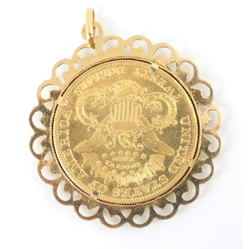 107 - A yellow metal mounted USA $20 coin, dated 1904, within openwork yellow metal pendant mount, 6cm lon... 