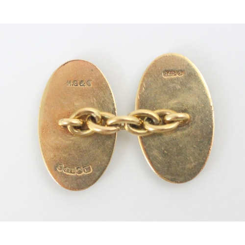 109 - A pair of 9ct yellow gold cufflinks, the oval links with engine turned detail, stamped 'HG&S' Birmin... 