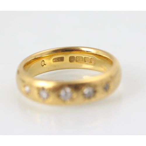 110 - A 22ct yellow gold diamond set ring, the five graduated old cut diamonds later set into a 22ct yello... 