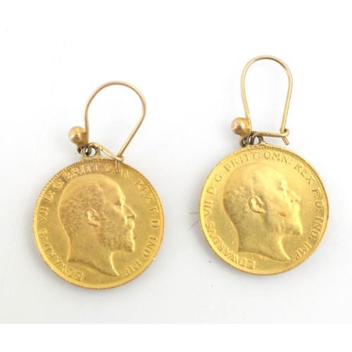 123 - A pair of Edward VII half sovereign set earrings, dated 1910 and 1909, with associated mounted sheph... 