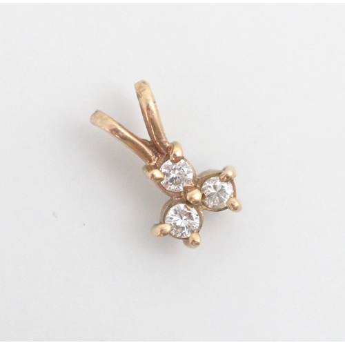 133 - A pair of diamond stud earrings, the round cut diamonds in a four claw setting, with post and butter... 