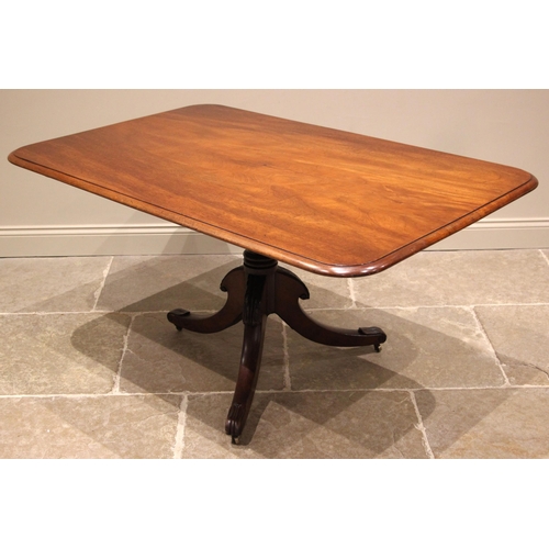 719 - A mahogany breakfast/centre table, mid 19th century, the rectangular moulded tilt top upon a ring tu... 