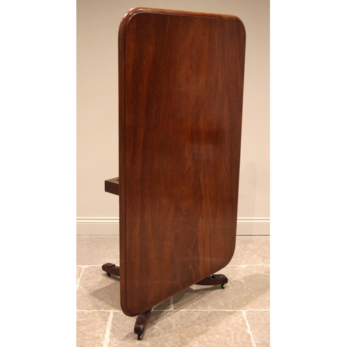 719 - A mahogany breakfast/centre table, mid 19th century, the rectangular moulded tilt top upon a ring tu... 