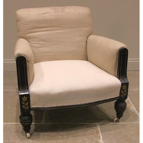 727 - A Victorian Aesthetic Movement armchair, the padded arms enclosing a gently bowed sprung seat, flank... 