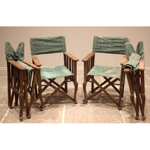 733 - Four stained beech wood folding director's chairs, 20th century, of slatted form upon a folding 'X' ... 