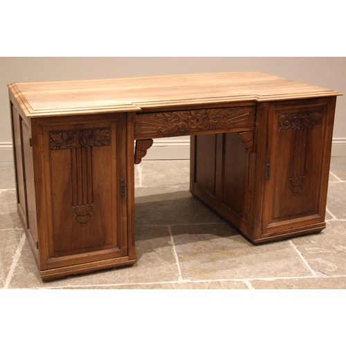 745 - A walnut twin pedestal desk, late 19th/early 20th century, probably French, the inverted breakfront ... 