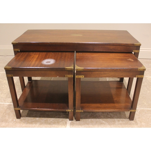 768 - A nest of three mahogany campaign revival tables, late 20th century, to include; a pair of lamp tabl... 