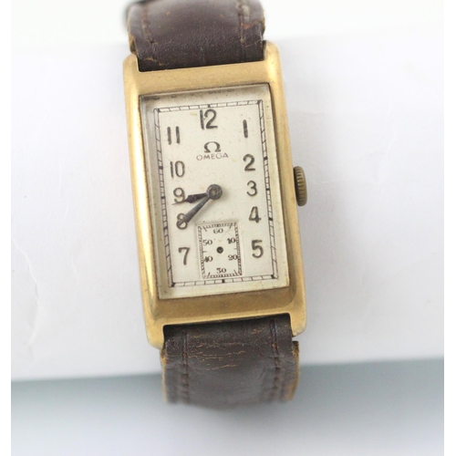 77 - An early 20th century Omega wristwatch, the rectangular dial with Arabic numerals and subsidiary dia... 