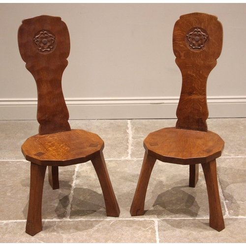 770 - Thomas 'Gnomeman' Whittaker of Littlebeck, a pair of adzed oak spinning chairs, mid 20th century, th... 