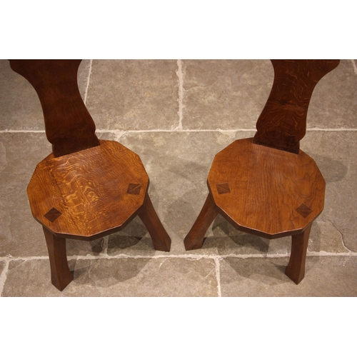 770 - Thomas 'Gnomeman' Whittaker of Littlebeck, a pair of adzed oak spinning chairs, mid 20th century, th... 