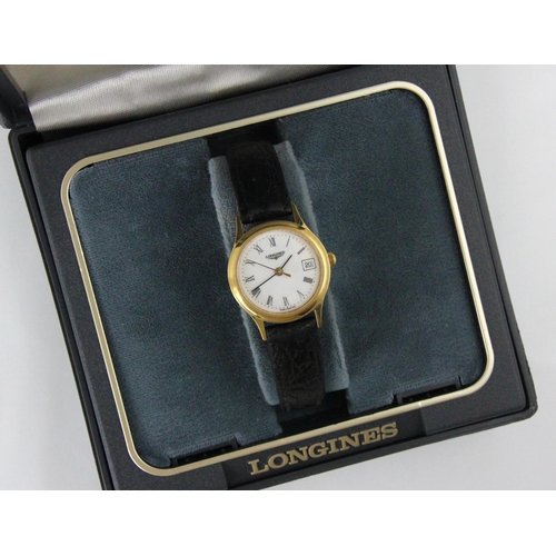 79 - A gold plated ladies Longines wristwatch, the circular white dial with Roman numerals, set to plain ... 