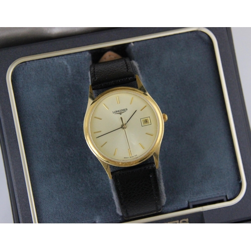 80 - A gold plated gentlemans Longines wristwatch, the circular gold coloured dial with baton markers, se... 