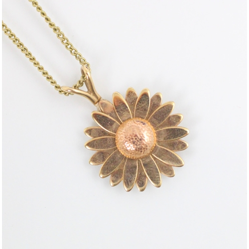 156 - A Clogau 9ct gold ‘sunflower’ pendant, with realistic engraved detail, stamped to reverse, upon asso... 