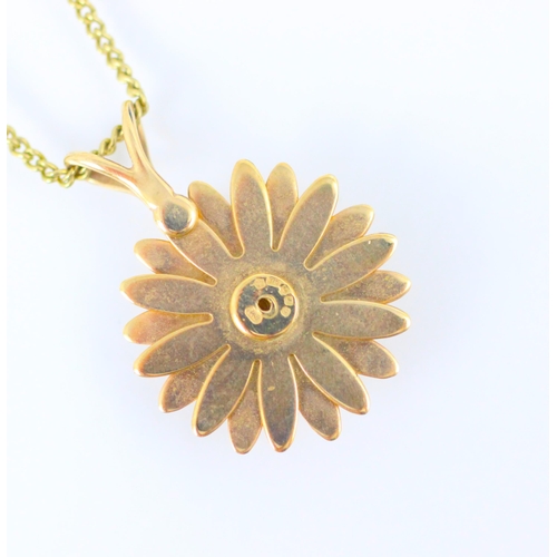 156 - A Clogau 9ct gold ‘sunflower’ pendant, with realistic engraved detail, stamped to reverse, upon asso... 