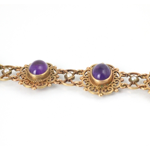 162 - A 9ct yellow gold and untested amethyst set bracelet, the seven openwork panels set with cabochon cu... 