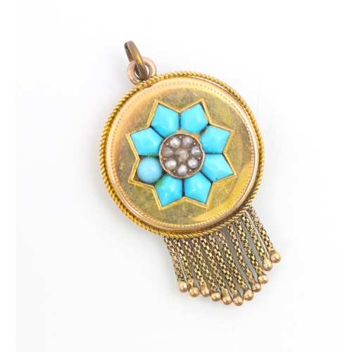 164 - A 19th century style turquoise coloured stone set pendant/locket, the circular yellow metal pendant ... 