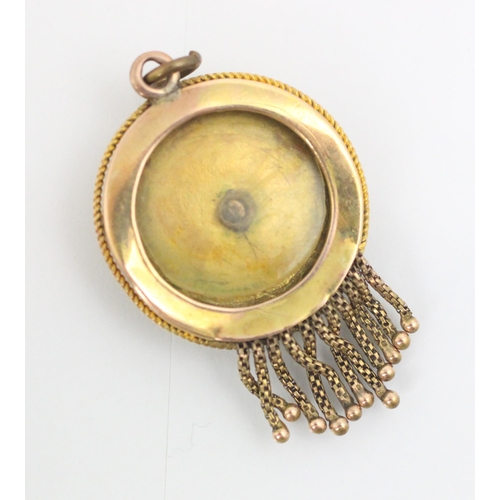 164 - A 19th century style turquoise coloured stone set pendant/locket, the circular yellow metal pendant ... 