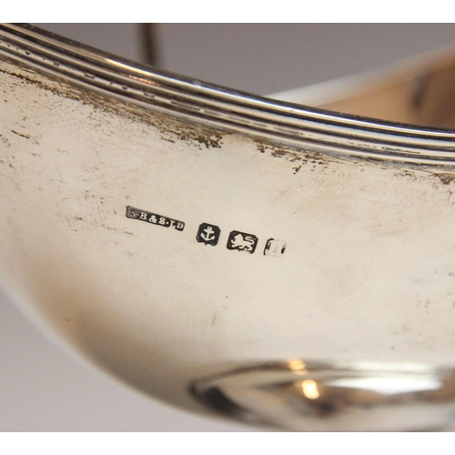 6 - A George V silver swing handled bon bon dish, S Blanckensee & Son Ltd, Birmingham 1919, the grooved ... 