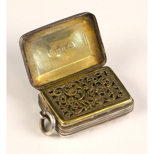 36 - A George III silver vinaigrette, Ledsam and Vale, Birmingham 1819, the hinged cover with cast floral... 