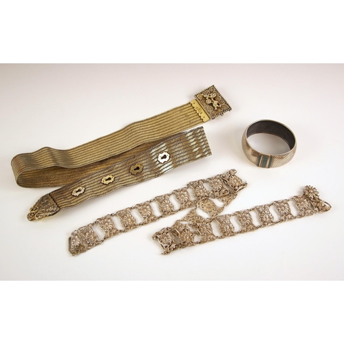 61 - A selection of silver and silver coloured items, including an Edwardian belt, designed as panels wit... 