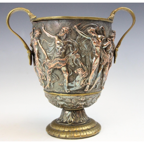 65 - A 19th century repousse cup, possibly by Elkington & Co, decorated with a continuous frieze of Bacch... 