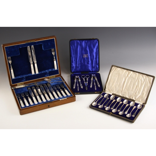 70 - A selection of silver and silver plated flatware, including a cased canteen of mother of pearl handl... 