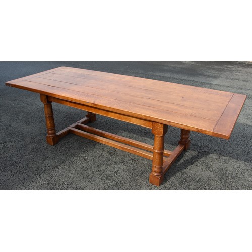 773 - A medium oak refectory table in the 17th century style, late 20th/early 21st century, the cleated pl... 