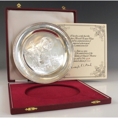 173 - A silver British Empire plate, Roberts and Dore Ltd, London 1972, 329/1700, cased with certificate o... 