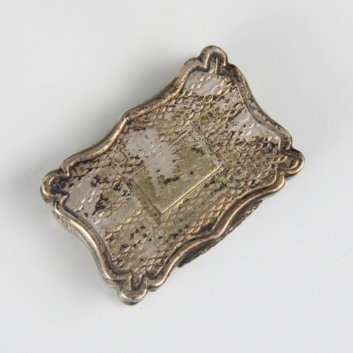 103 - A Victorian silver vinaigrette, Edward Smith, Birmingham 1843, the rectangular hinged cover with sha... 