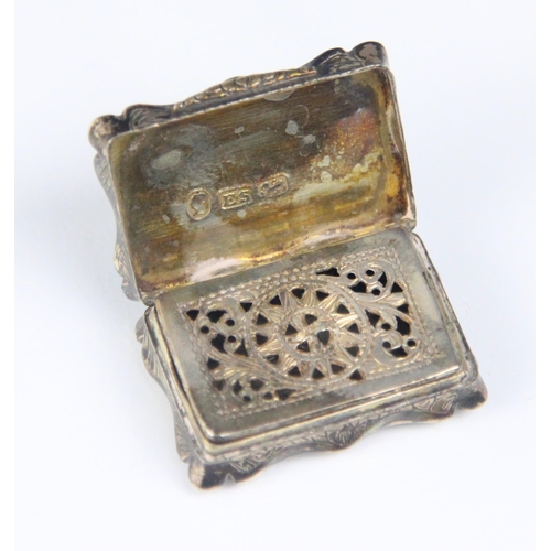 103 - A Victorian silver vinaigrette, Edward Smith, Birmingham 1843, the rectangular hinged cover with sha... 