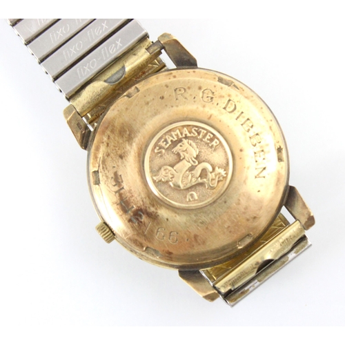 137 - A yellow metal cased Omega Seamaster automatic wristwatch, the circular cream dial with baton marker... 