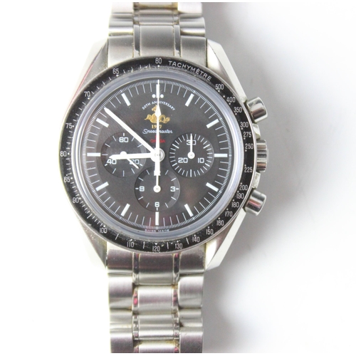 151 - An Omega Speedmaster professional 50th anniversary moon  wrist watch, the circular black dial with b... 