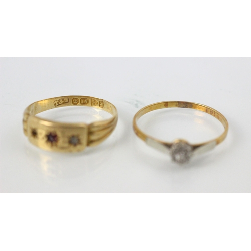 191 - An 18ct yellow gold and untested ruby ring, the rectangular panel set with central round cut red sto... 