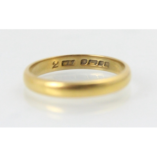 207 - A 22ct yellow gold wedding band, stamped 'WM' Birmingham 1951, ring size L 1/2, 2.8gms