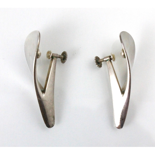 213 - A pair of Georg Jensen silver earrings, designed by Nanna Ditzel, the plain polished stylised tear d... 