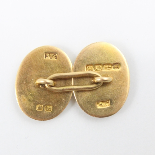 273 - A pair of 18ct yellow gold cufflinks, the oval links with engraved monogram to one side, plain polis... 