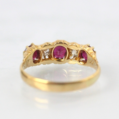 294 - A 19th century untested ruby and diamond five stone ring, the central cushion cut untested ruby with... 