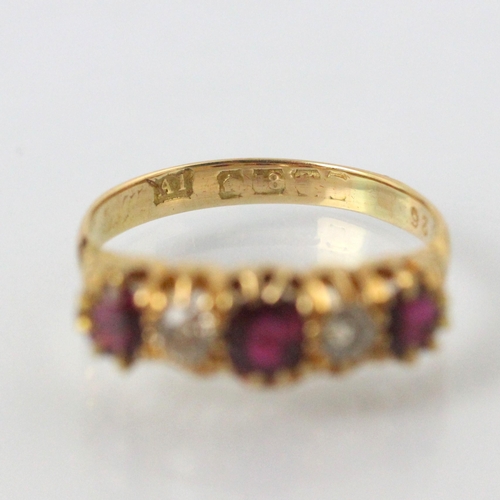 294 - A 19th century untested ruby and diamond five stone ring, the central cushion cut untested ruby with... 