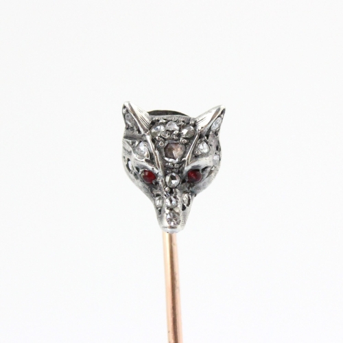 348 - A 19th century diamond set foxes head stick pin, the fox head set with fifteen mixed cut diamonds an... 