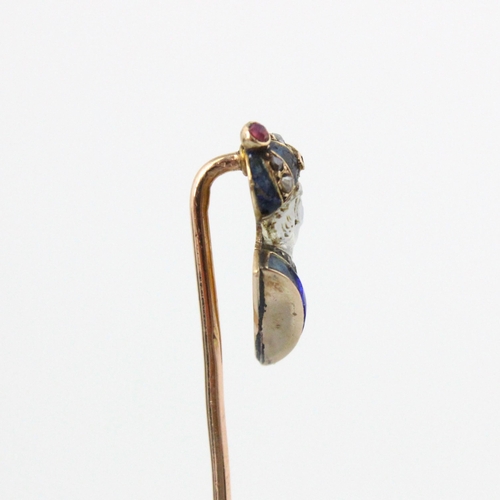 350 - A French carved untested moonstone, diamond and enamel stick pin, the head designed as a side profil... 