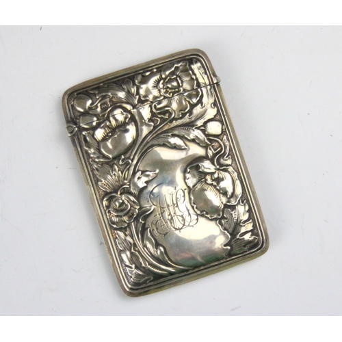 38 - An Edwardian silver card case, Horton & Allday, Birmingham 1903, the rectangular case with all over ... 