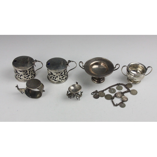 56 - A pair of Edwardian silver wet mustards, Charles Horner, Birmingham 1902, the florally pierced openw... 