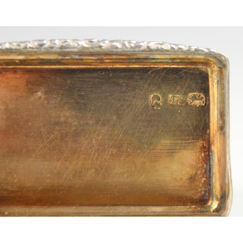 61 - A George IV silver snuff box, ‘TS’ Birmingham 1829, the rectangular cover with engraved monogram, op... 