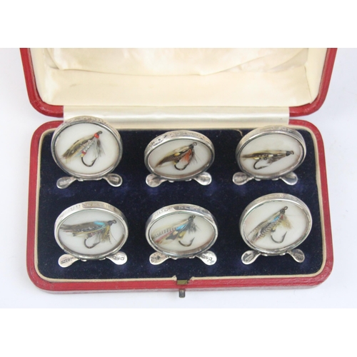 67 - Fly Fishing Interest: A cased set of George V silver mounted menu/name card holders, Grey & Co, Ches... 