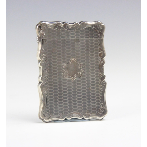 70 - A Victorian silver card case, Nathaniel Mills, Birmingham 1854, the shaped borders enclosing continu... 