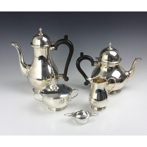 75 - A near matched silver four piece tea and coffee service, Barker Ellis Silver Co, Birmingham 1970/197... 