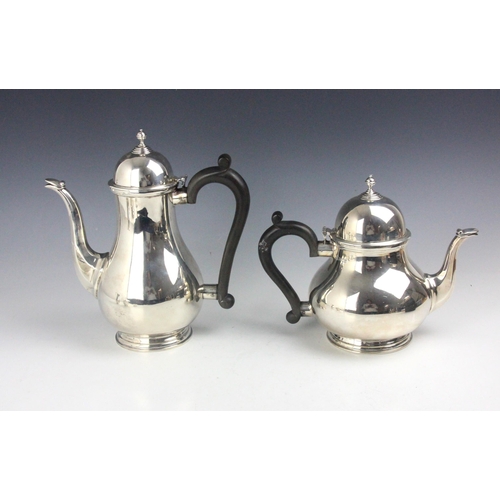 75 - A near matched silver four piece tea and coffee service, Barker Ellis Silver Co, Birmingham 1970/197... 