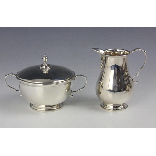 75 - A near matched silver four piece tea and coffee service, Barker Ellis Silver Co, Birmingham 1970/197... 