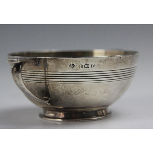 85 - A George V silver twin handled bowl, Selfridge & Co Ltd, Birmingham 1920, the angular handles above ... 